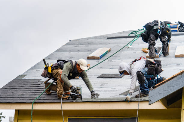 Professional Roofing technician working in West Bloomfield, NY
